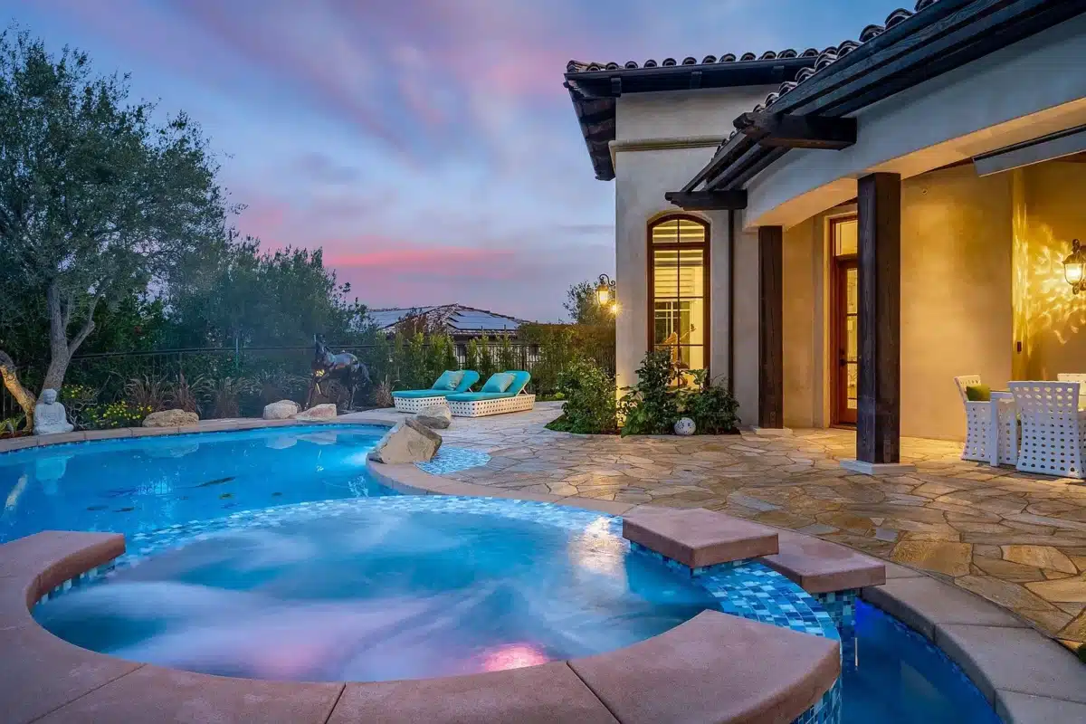 Pool and Spa Detail at The Bridges Estate Spa and pool detail with evening lighting at a luxury estate in The Bridges Rancho Santa Fe
