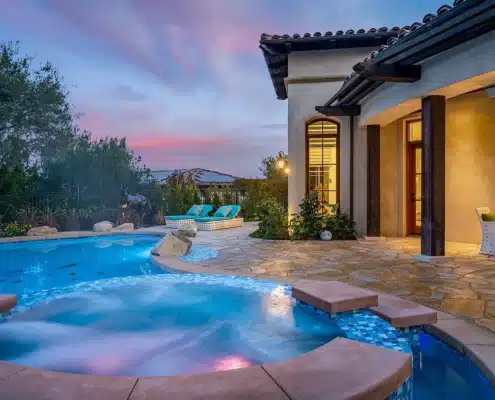 Pool and Spa Detail at The Bridges Estate Spa and pool detail with evening lighting at a luxury estate in The Bridges Rancho Santa Fe